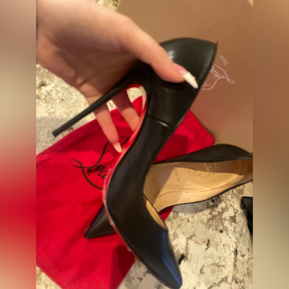Black Christian Louboutin‘s heels